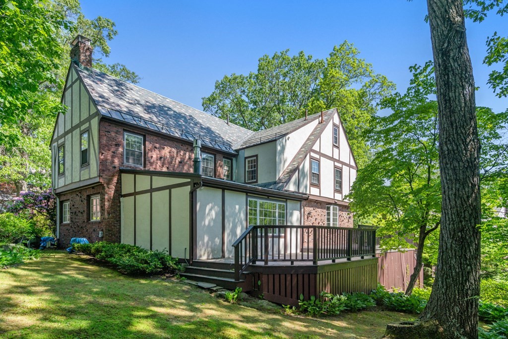 63 Bonad Road Newton, MA 02465 - Photo 13 of 15 a view of a house with a yard and deck