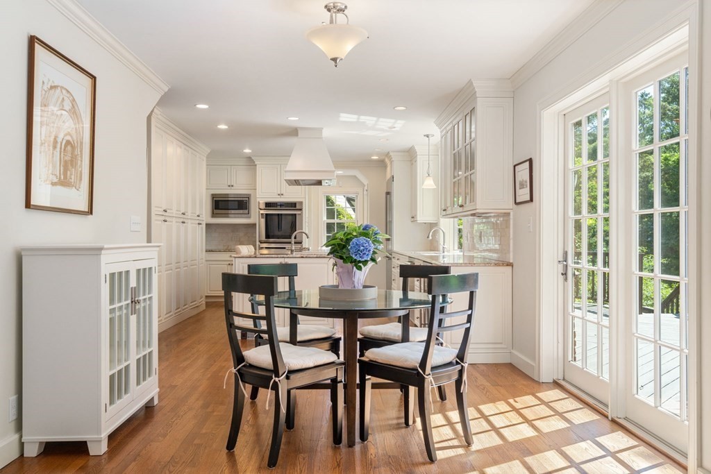 63 Bonad Road Newton, MA 02465 - Photo 5 of 15 a view of a dining room with furniture and wooden floor