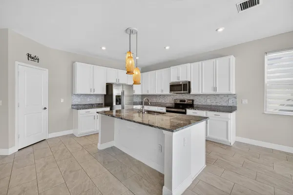 $489,000 | 10916 Southwest Robbia Way, Port St. Lucie, FL 34987