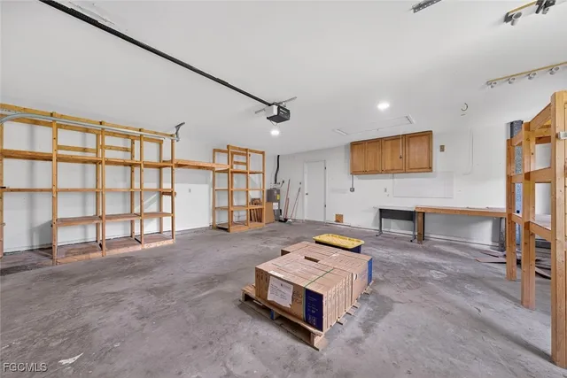 a living room with fireplace furniture and a flat screen tv