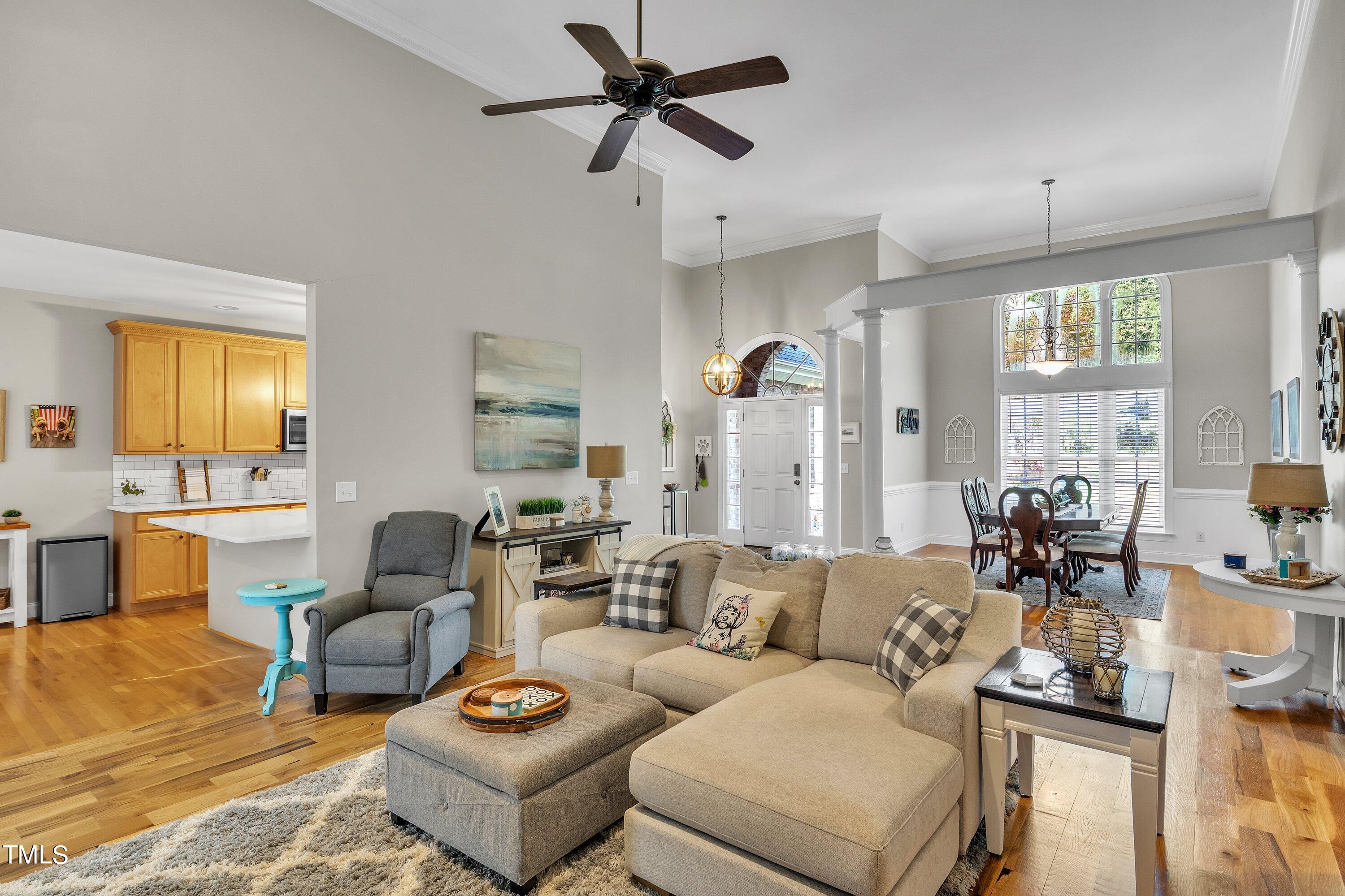 4617 Cherrybark Lane Raleigh, NC 27616 - Photo 19 of 53 a living room with furniture and a large window
