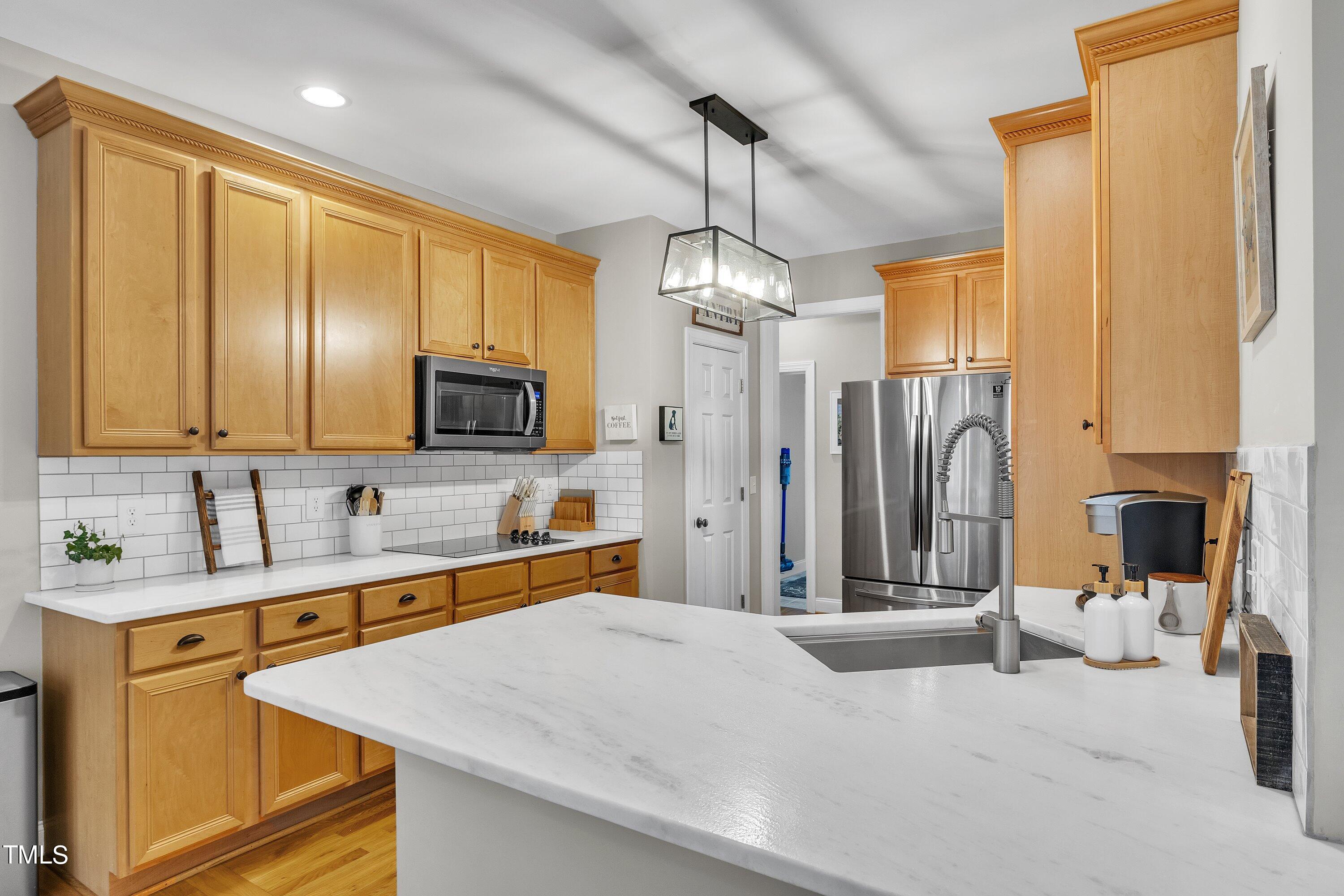 4617 Cherrybark Lane Raleigh, NC 27616 - Photo 23 of 53 a spacious bathroom with a granite countertop sink mirror and shower
