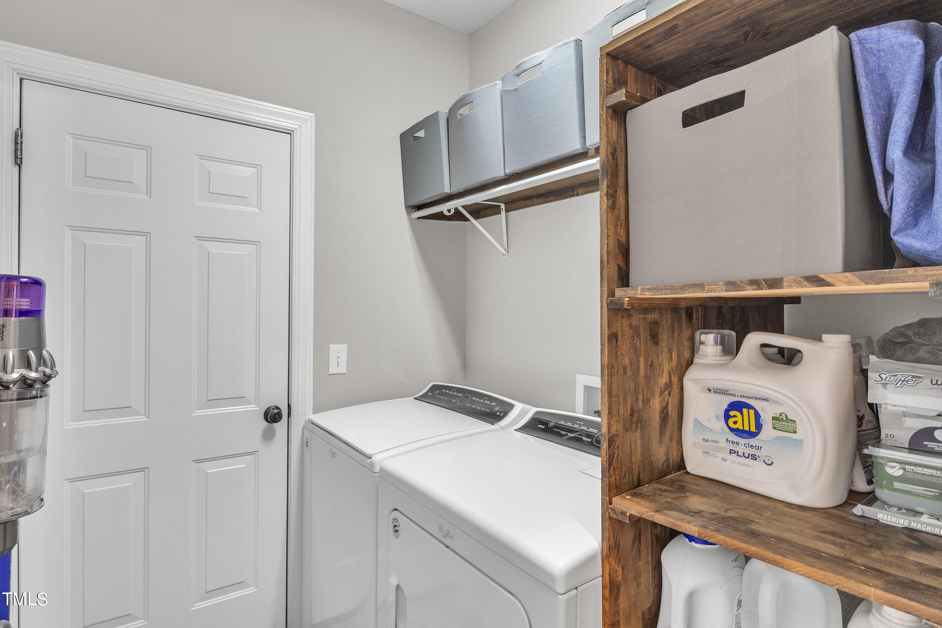 4617 Cherrybark Lane Raleigh, NC 27616 - Photo 31 of 53 a utility room with dryer and washer