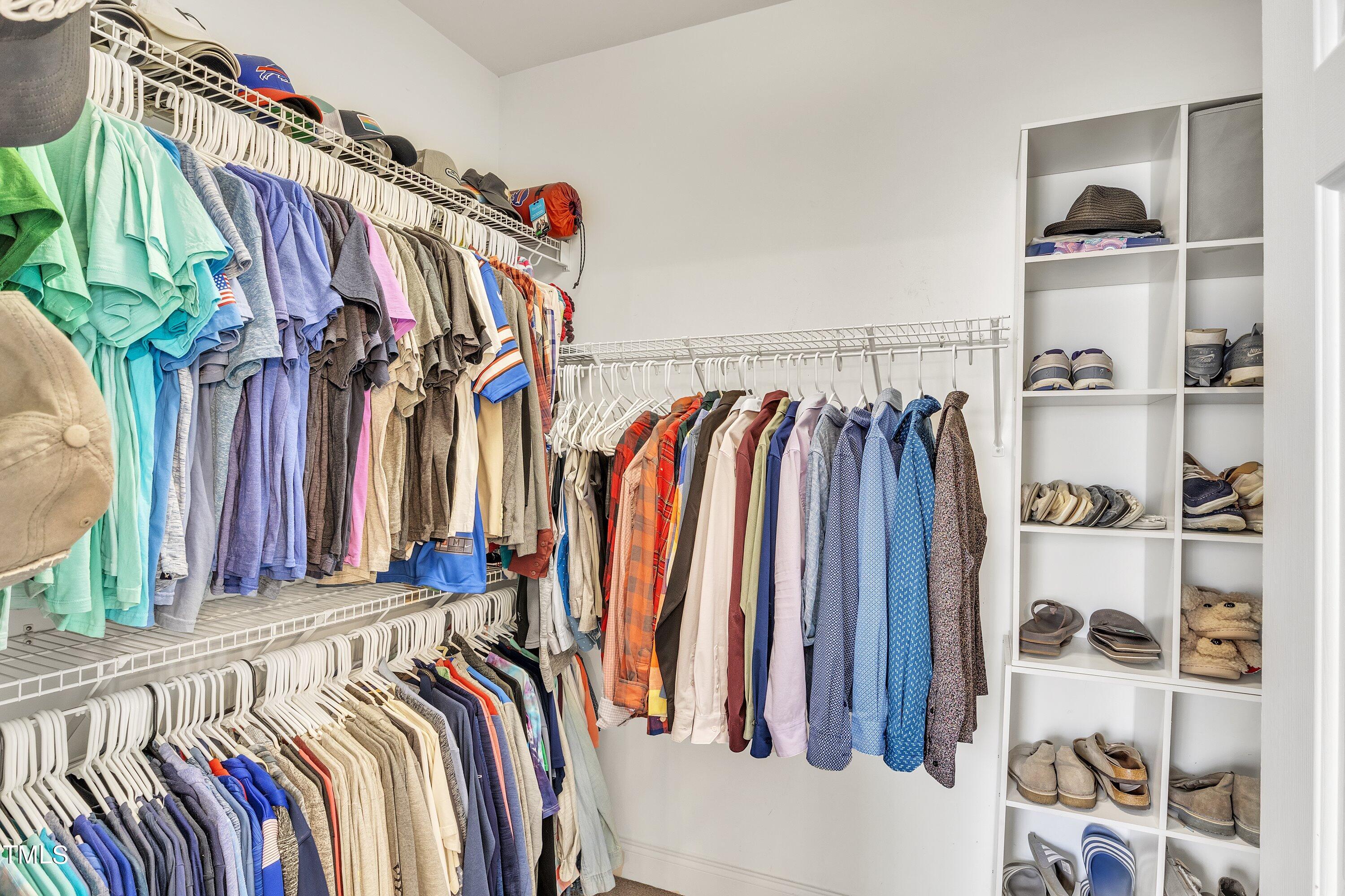 4617 Cherrybark Lane Raleigh, NC 27616 - Photo 40 of 53 a view of walk in closet with clothes and shoes