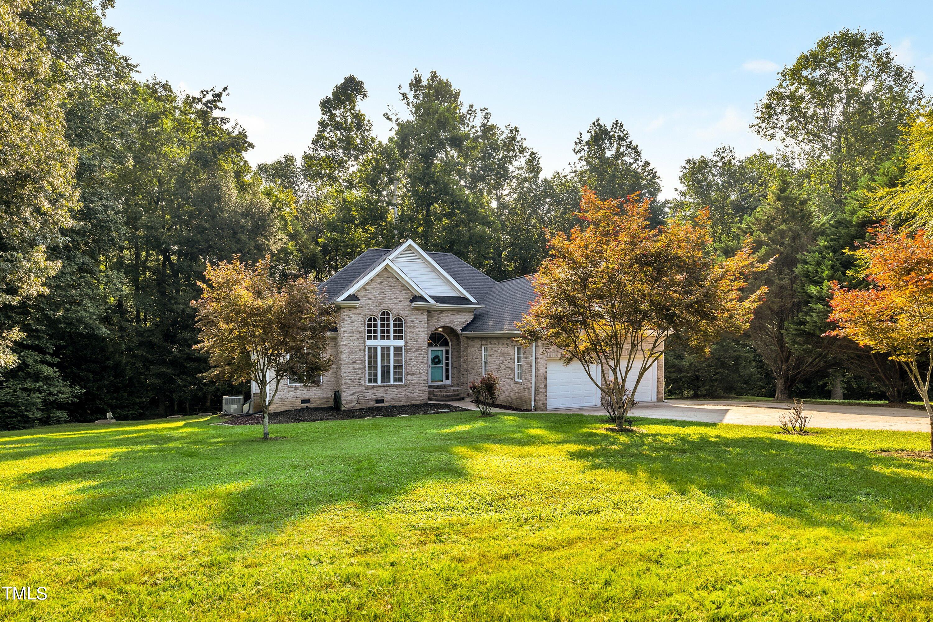 4617 Cherrybark Lane Raleigh, NC 27616 - Photo 5 of 53 a view of a house with a yard