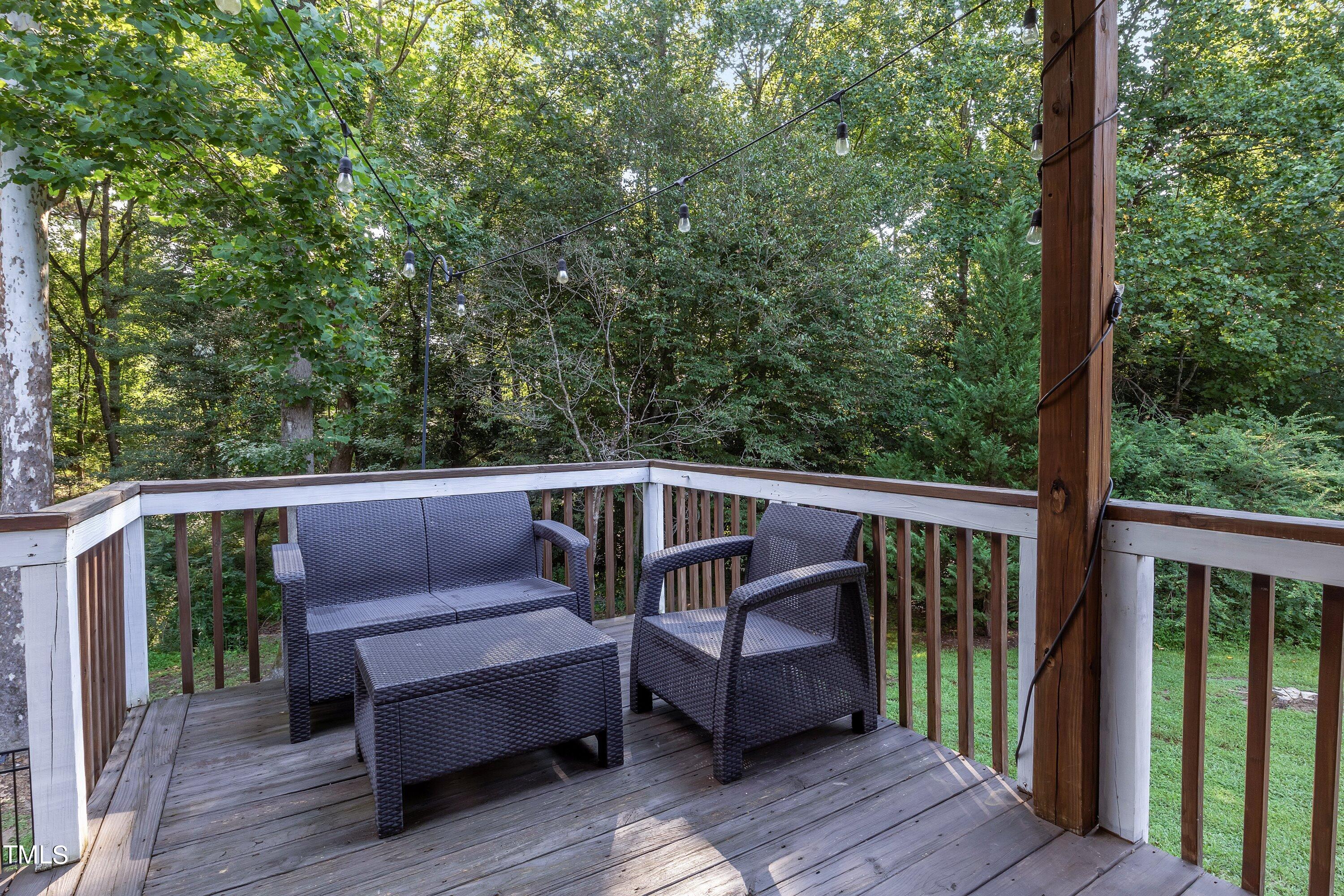 4617 Cherrybark Lane Raleigh, NC 27616 - Photo 51 of 53 a view of a two chairs in the deck
