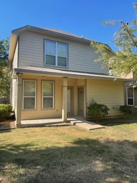 2513 South 2nd Street, Unit 3 Waco, TX 76706 - Photo 4 of 35 a front view of a house with a yard