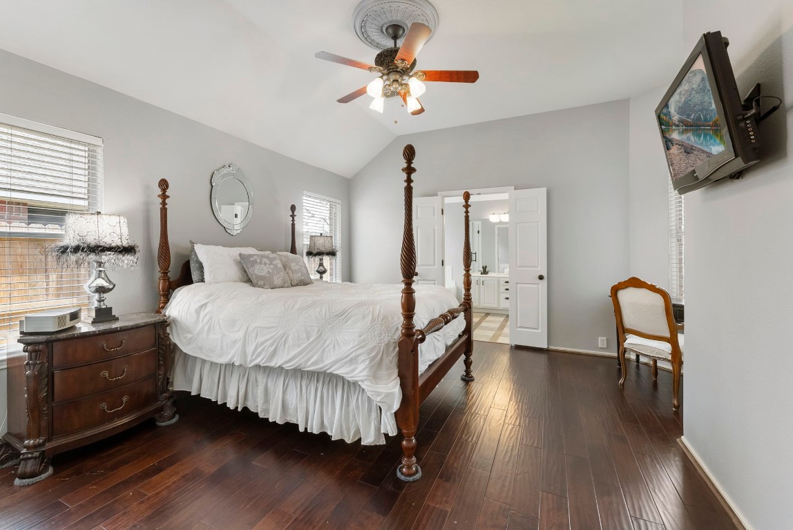 2015 Louetta Brook Court Spring, TX 77388 - Photo 12 of 28 a bedroom with a bed and wooden floor