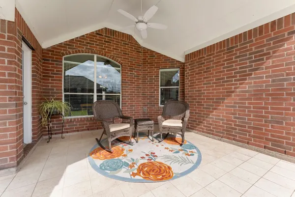 a backyard of a house with seating space