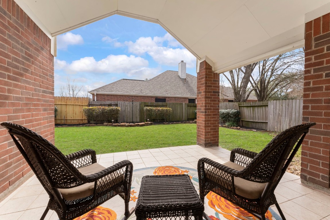 2015 Louetta Brook Court Spring, TX 77388 - Photo 23 of 28 a backyard of a house with outdoor seating