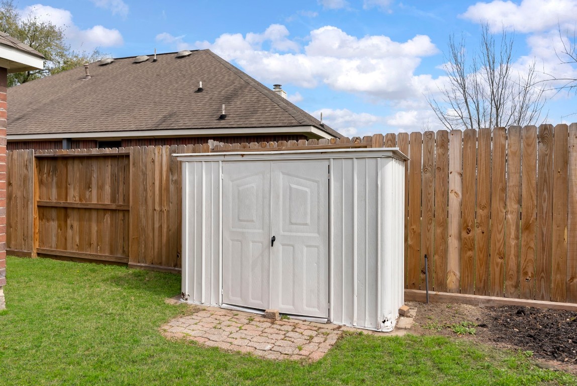 2015 Louetta Brook Court Spring, TX 77388 - Photo 25 of 28 a view of backyard with cabin