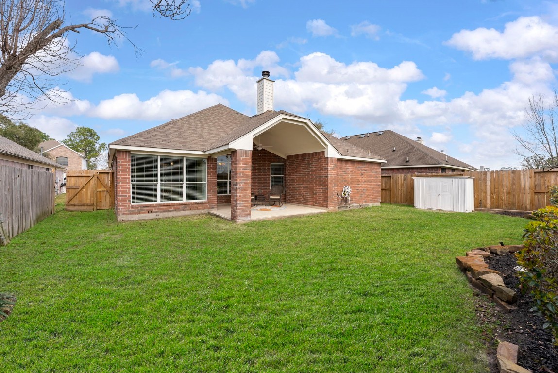 2015 Louetta Brook Court Spring, TX 77388 - Photo 27 of 28 a view of a house with a yard