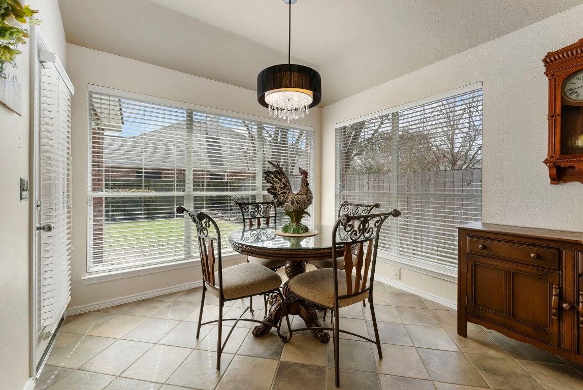 2015 Louetta Brook Court Spring, TX 77388 - Photo 10 of 28 a dining room with furniture and window