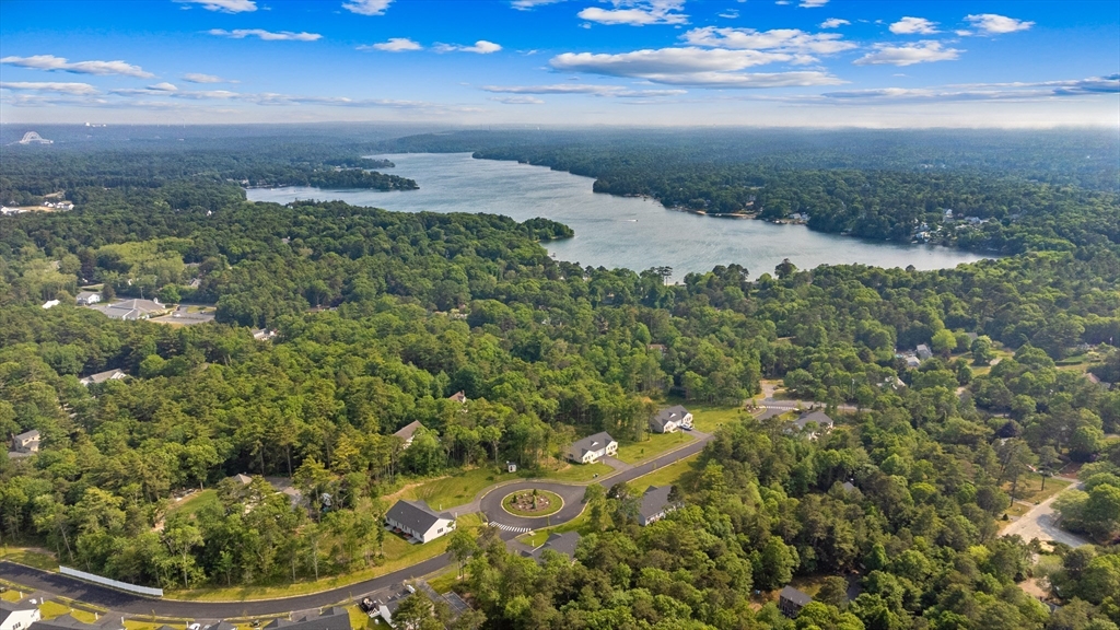 9 Tupper Hill Road, Unit 9 Plymouth, MA 02360 - Photo 29 of 30 a view of a yard with an ocean view