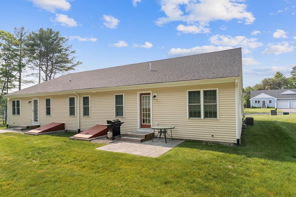 9 Tupper Hill Road, Unit 9 Plymouth, MA 02360 - Photo 4 of 30 a view of a house with backyard and a tree