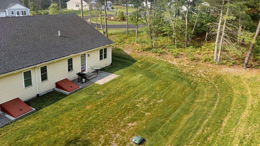 9 Tupper Hill Road, Unit 9 Plymouth, MA 02360 - Photo 5 of 30 an aerial view of residential houses with yard