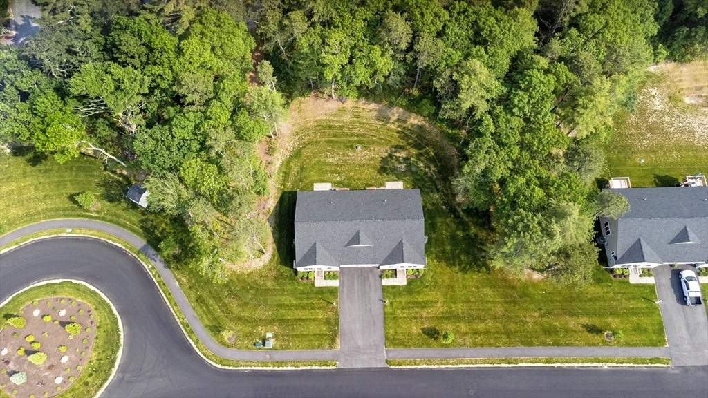 9 Tupper Hill Road, Unit 9 Plymouth, MA 02360 - Photo 6 of 30 a view of swimming pool with a yard