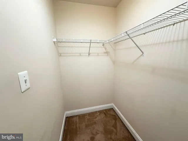 a view of small space with racks on the wall