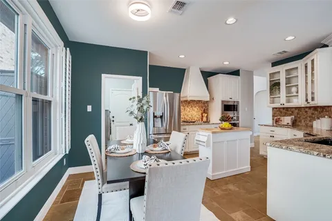 a view of a livingroom with a ceiling fan and window