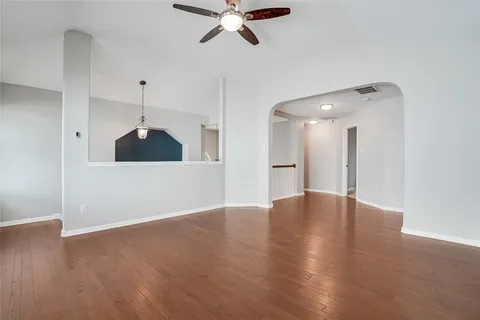 a spacious bathroom with a double vanity sink a mirror and a shower