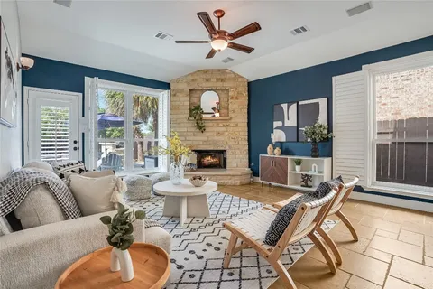 a view of an entryway with wooden floor and windows