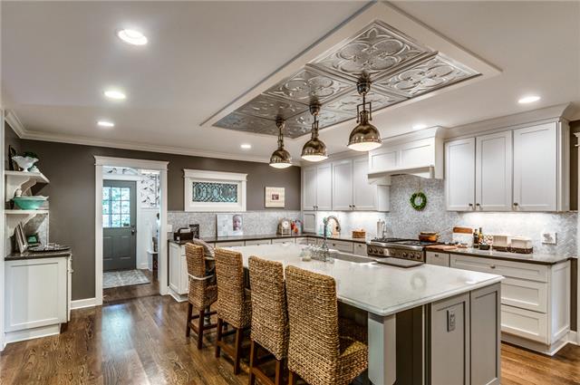 9550 Mullins Road Arrington, TN 37014 - Photo 1 of 20 Quartz countertops, farmhouse sink, custom tile backsplash, oversized island and lots of cabinet space!