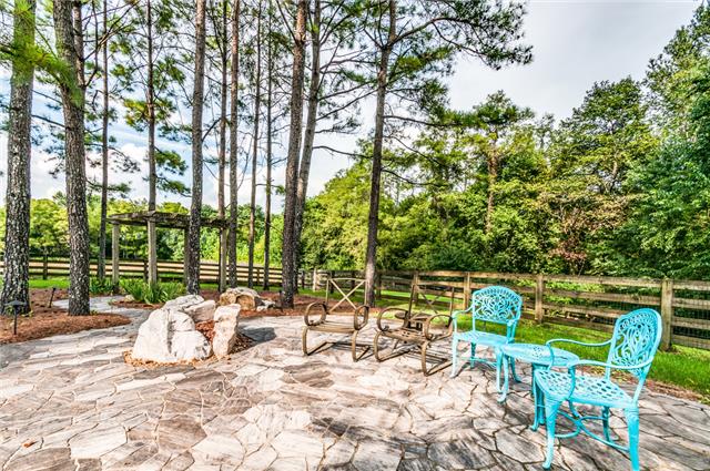 9550 Mullins Road Arrington, TN 37014 - Photo 18 of 20 This open patio with a gas firepit really makes entertaining guests a blast! This was added in 2014