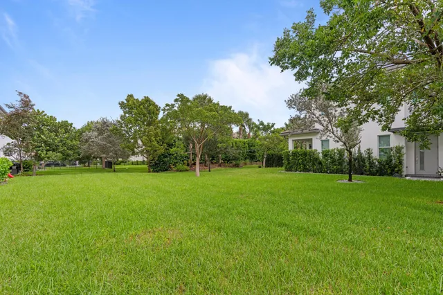 a view of a backyard with garden