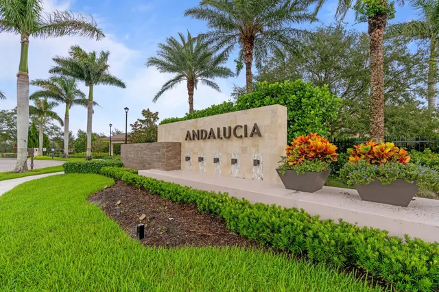 front view of the house with potted plants