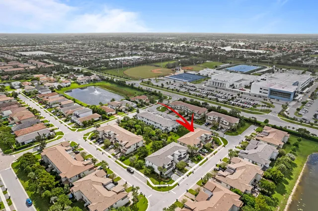 a sign on the side of the grass