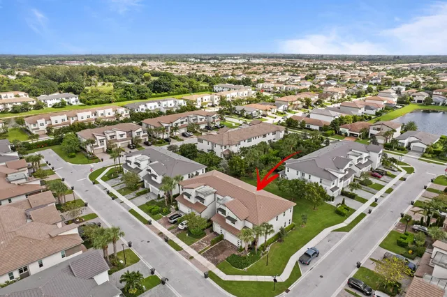 an aerial view of a city with lots of residential buildings