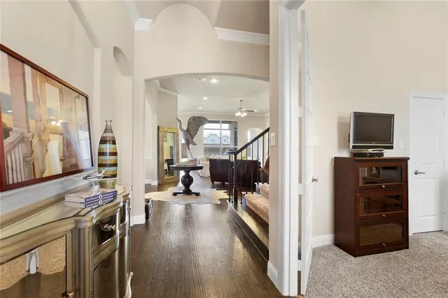a view of a living room and a flat screen tv