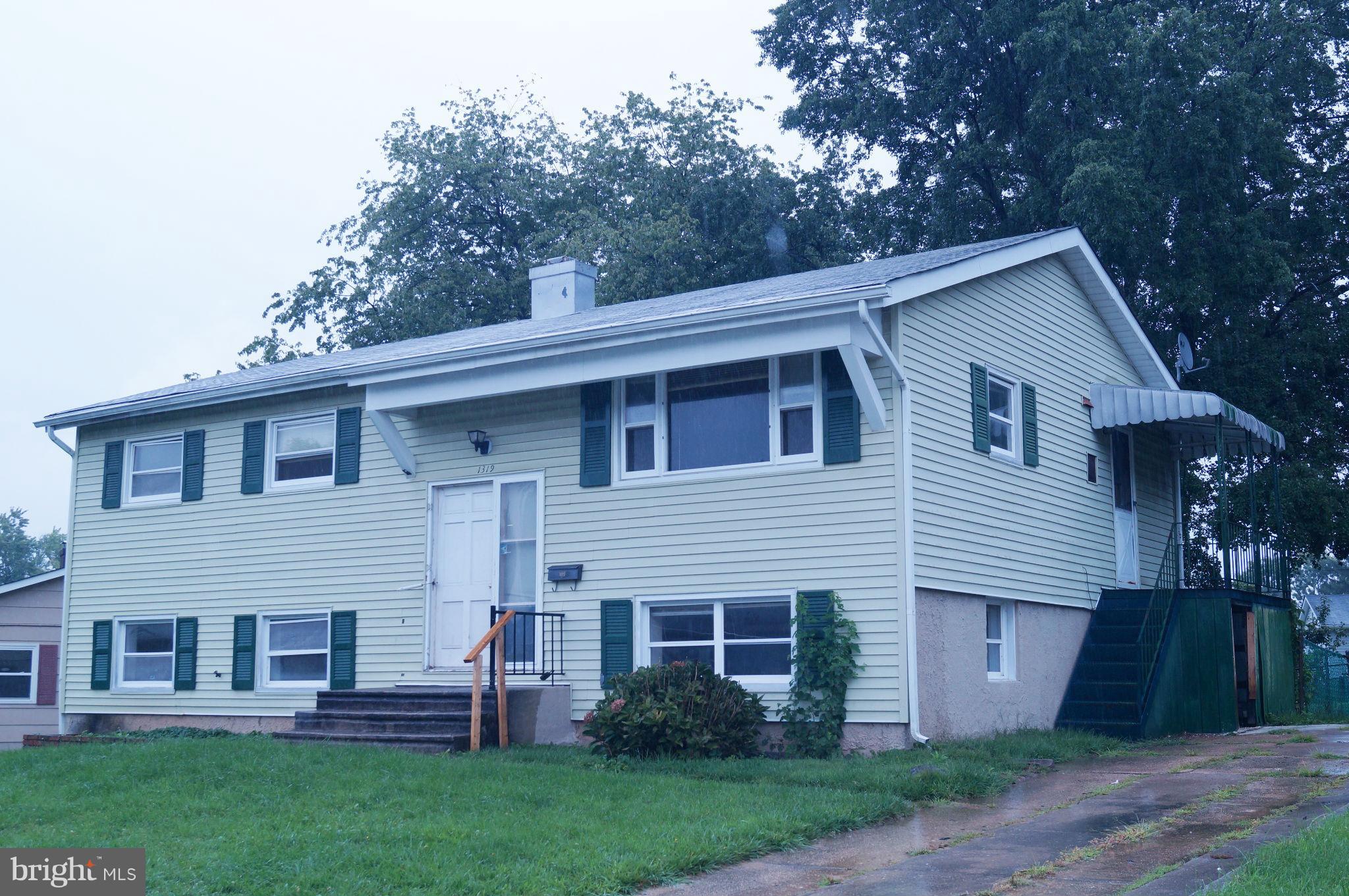 1319 Denbright Road Baltimore, MD 21228 - Photo 3 of 11 a view of a house with a yard