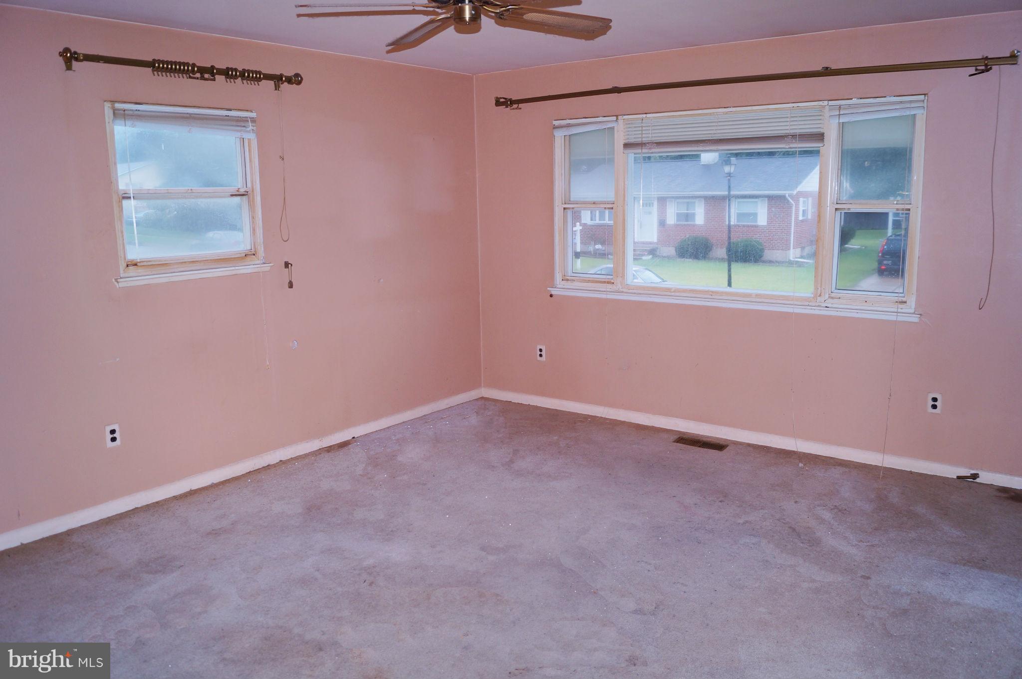 1319 Denbright Road Baltimore, MD 21228 - Photo 4 of 11 an empty room with a window
