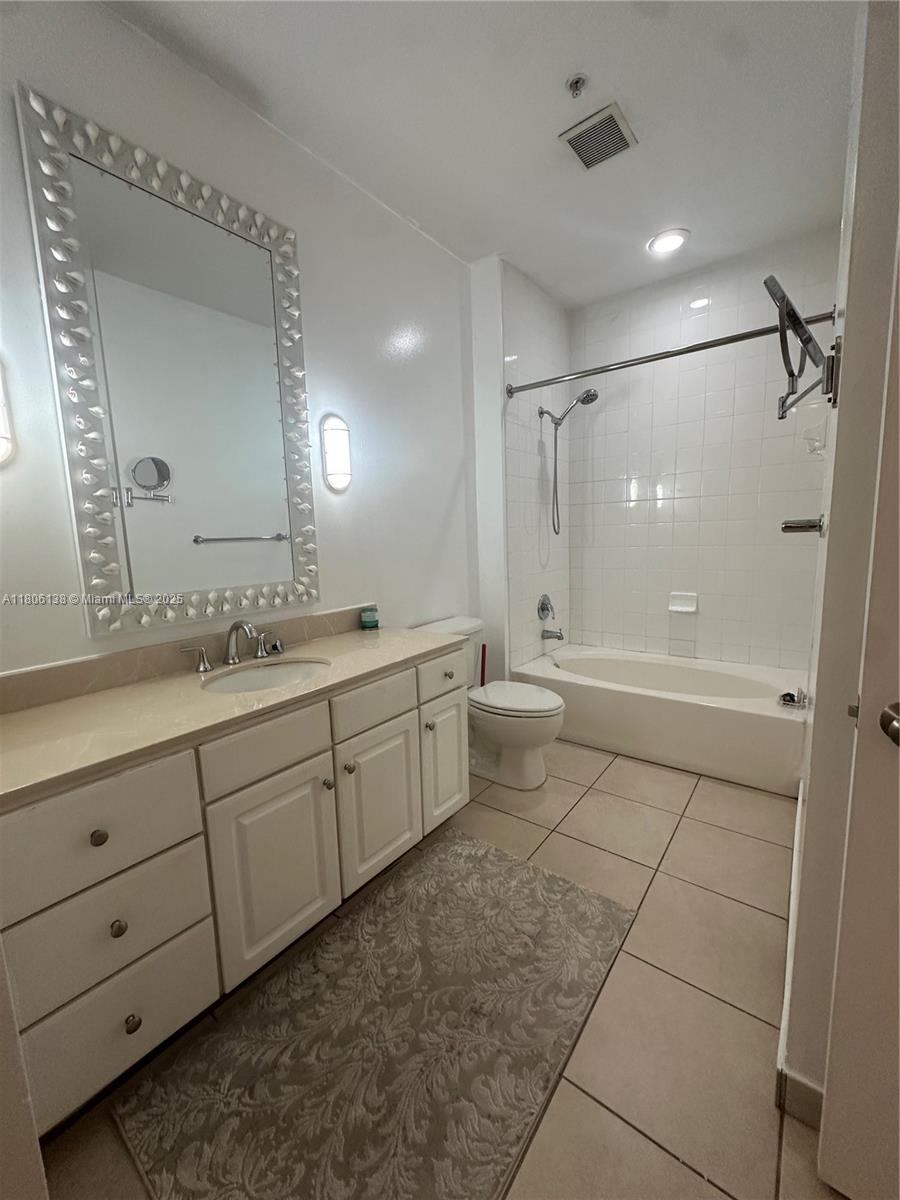 2001 Biscayne Boulevard, Unit 3503 Miami, FL 33137 - Photo 20 of 34 a spacious bathroom with a double vanity sink mirror and double