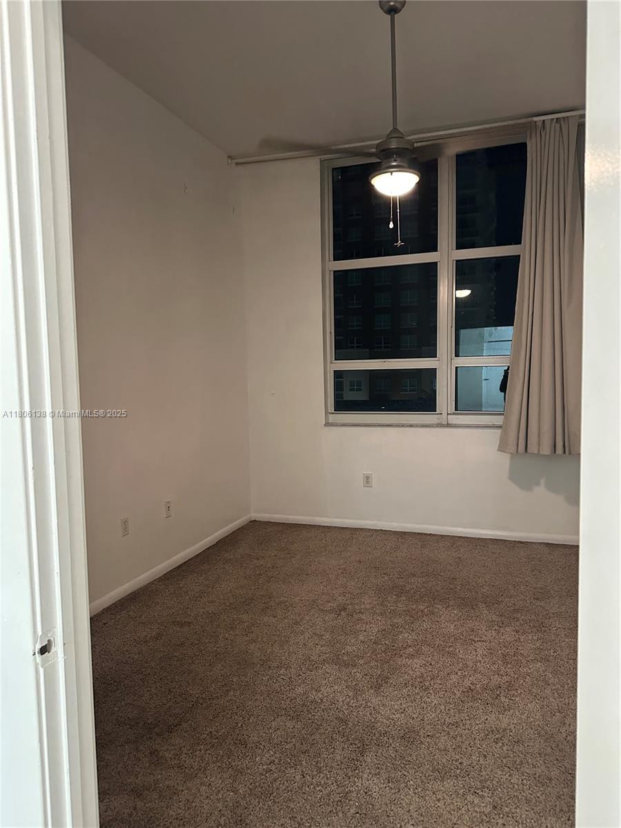 2001 Biscayne Boulevard, Unit 3503 Miami, FL 33137 - Photo 25 of 34 a view of an empty room with a window