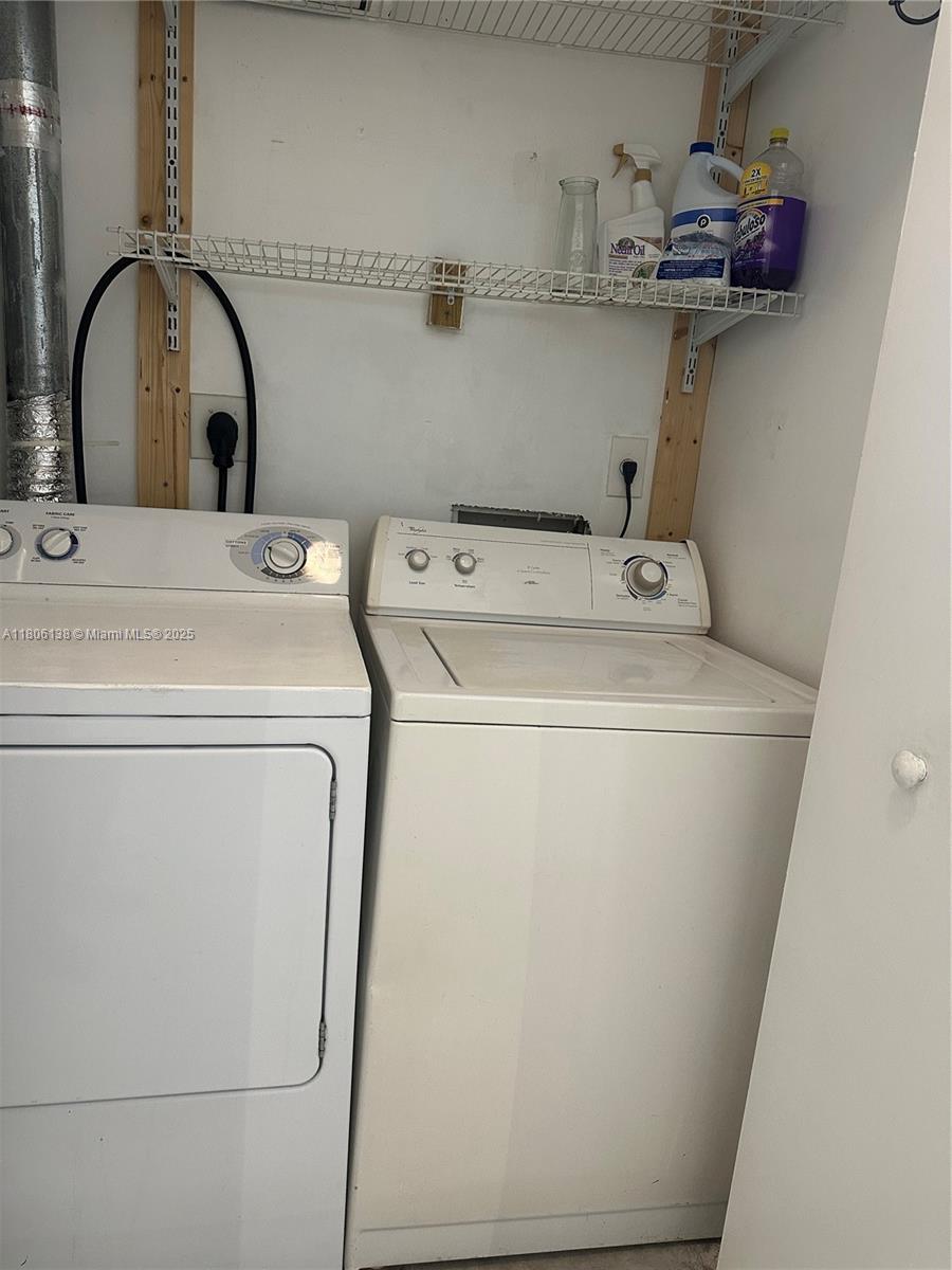 2001 Biscayne Boulevard, Unit 3503 Miami, FL 33137 - Photo 30 of 34 a utility room with dryer and washer