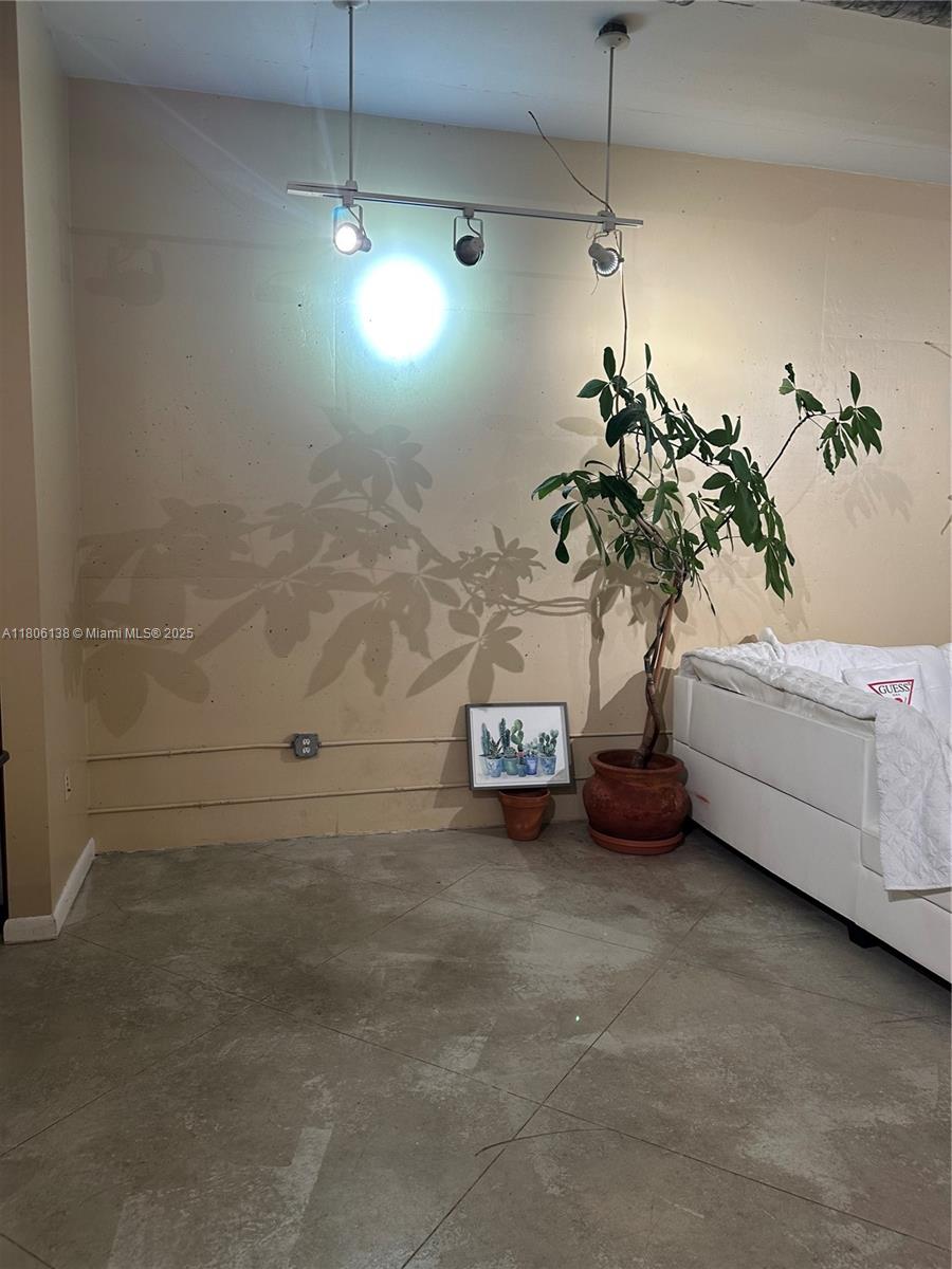 2001 Biscayne Boulevard, Unit 3503 Miami, FL 33137 - Photo 9 of 34 a picture of a room with a garage