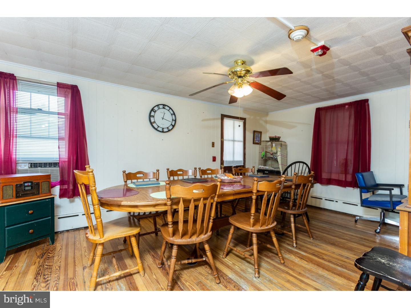 291 New Garden Road Avondale, PA 19311 - Photo 12 of 25 a view of a dining room with furniture and a chandelier