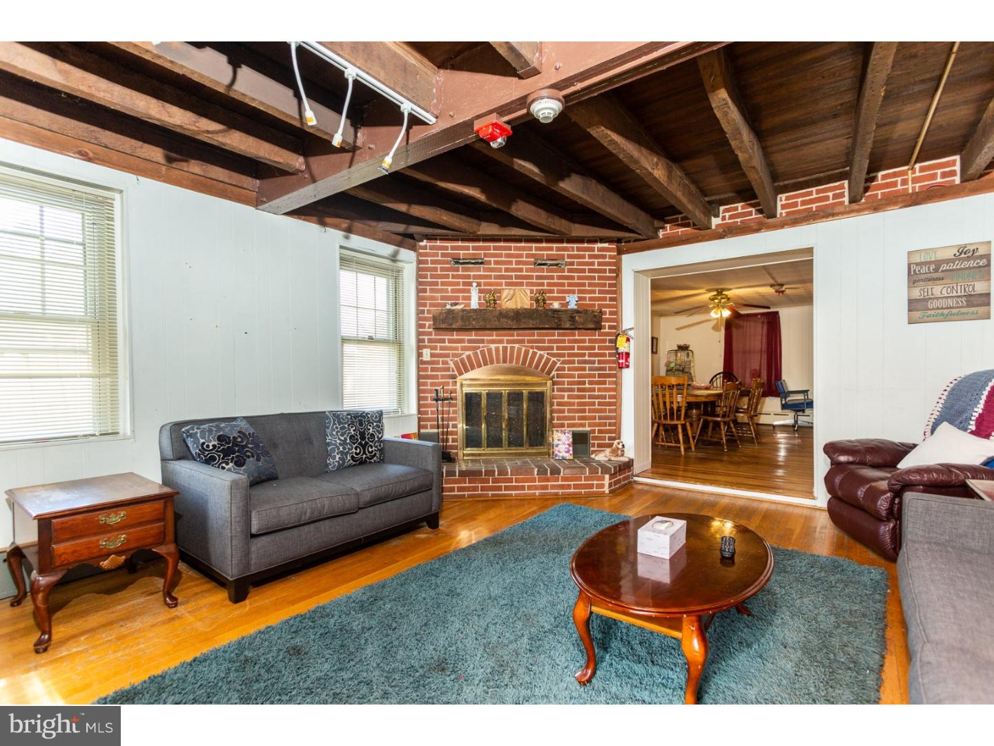 291 New Garden Road Avondale, PA 19311 - Photo 14 of 25 a living room with furniture and a large window