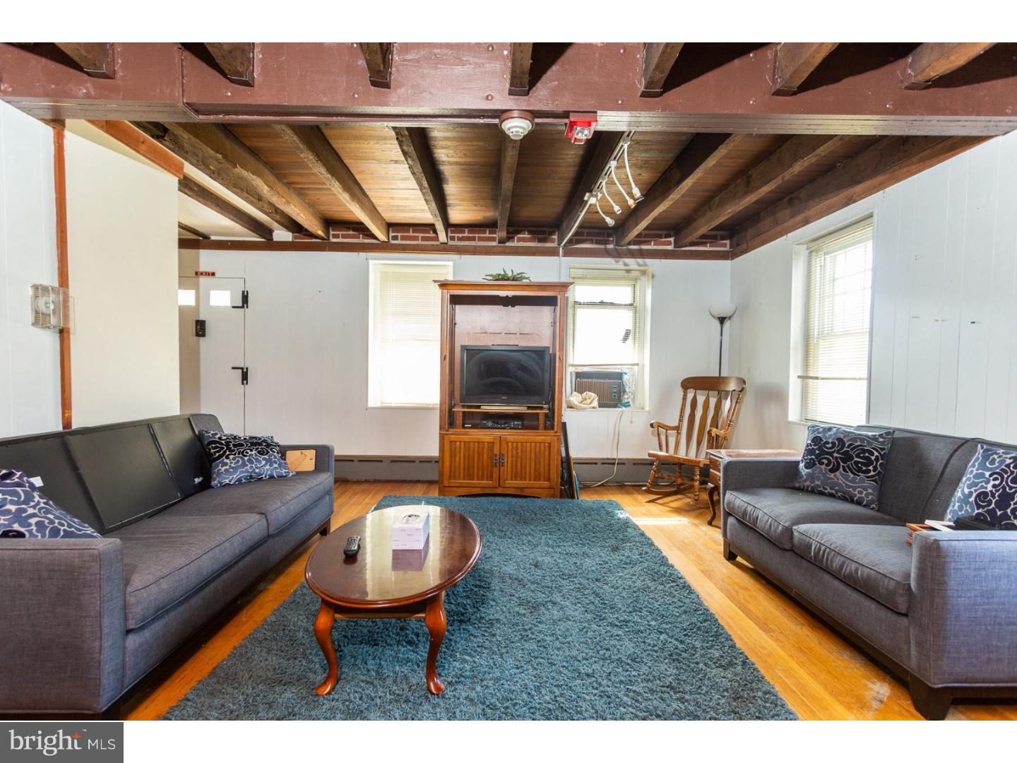 291 New Garden Road Avondale, PA 19311 - Photo 15 of 25 a living room with furniture and a large window