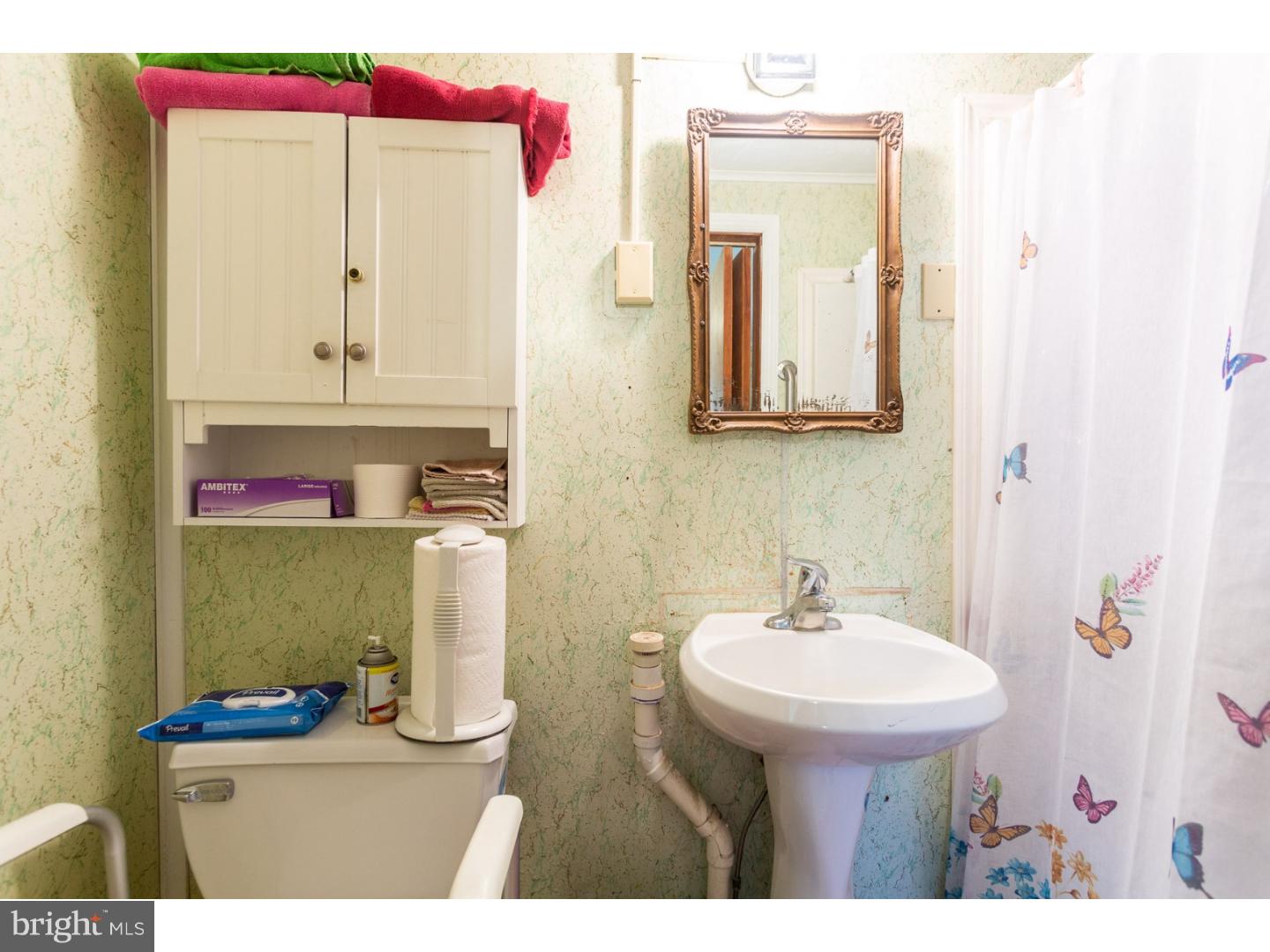 291 New Garden Road Avondale, PA 19311 - Photo 17 of 25 a bathroom with a sink mirror and vanity