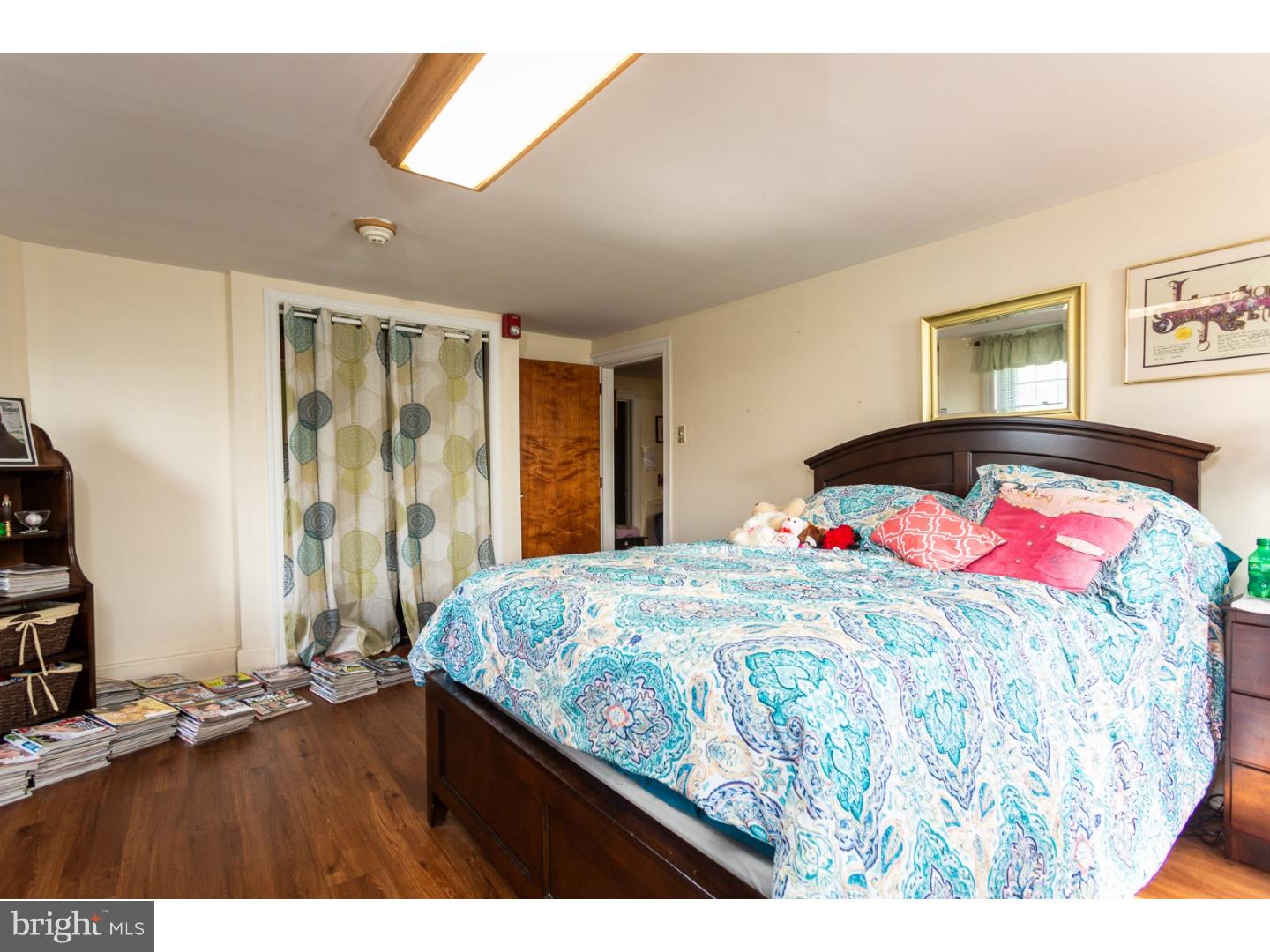 291 New Garden Road Avondale, PA 19311 - Photo 19 of 25 a bedroom with a bed and a dresser