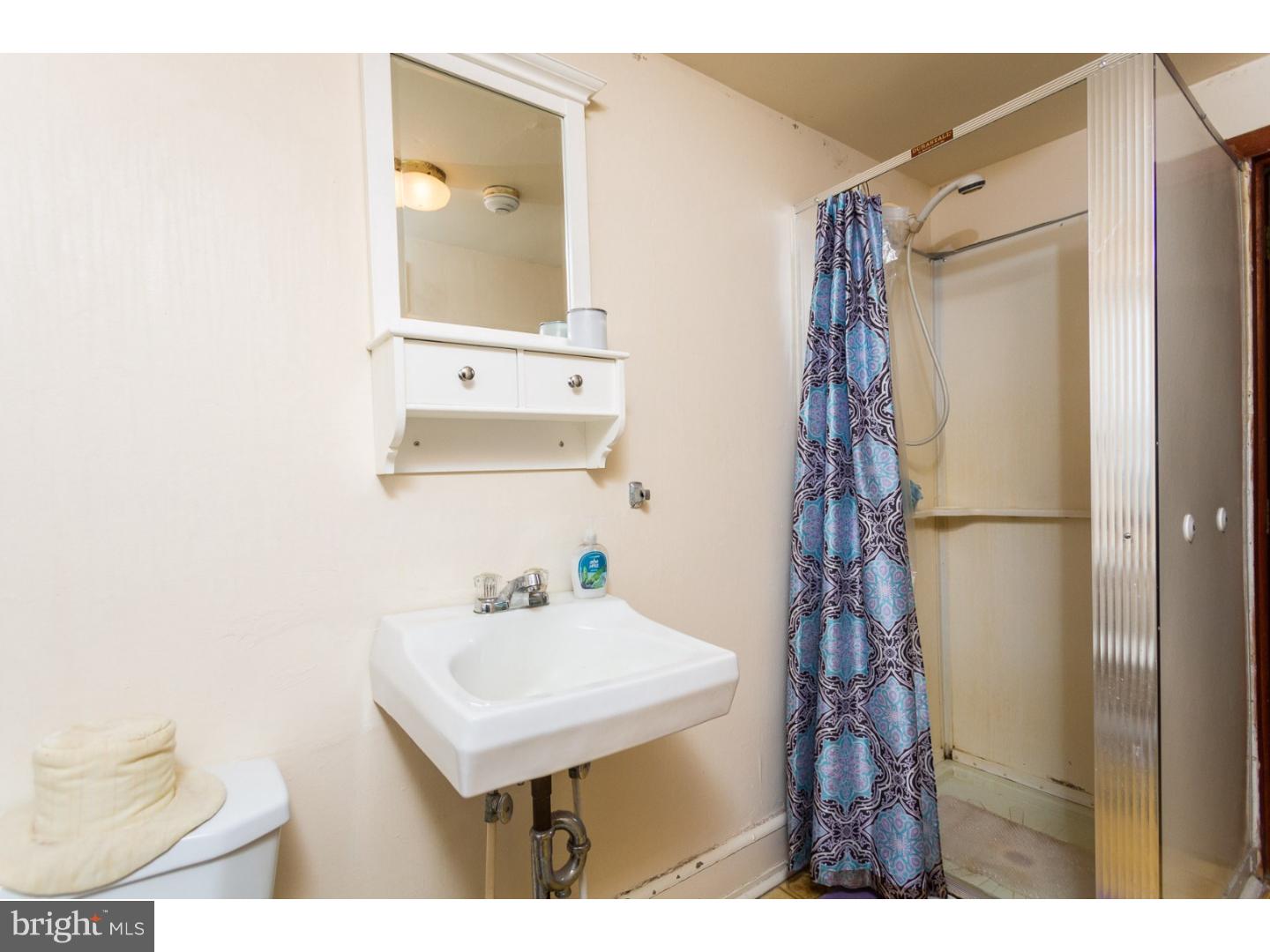 291 New Garden Road Avondale, PA 19311 - Photo 23 of 25 a bathroom with a sink toilet and shower