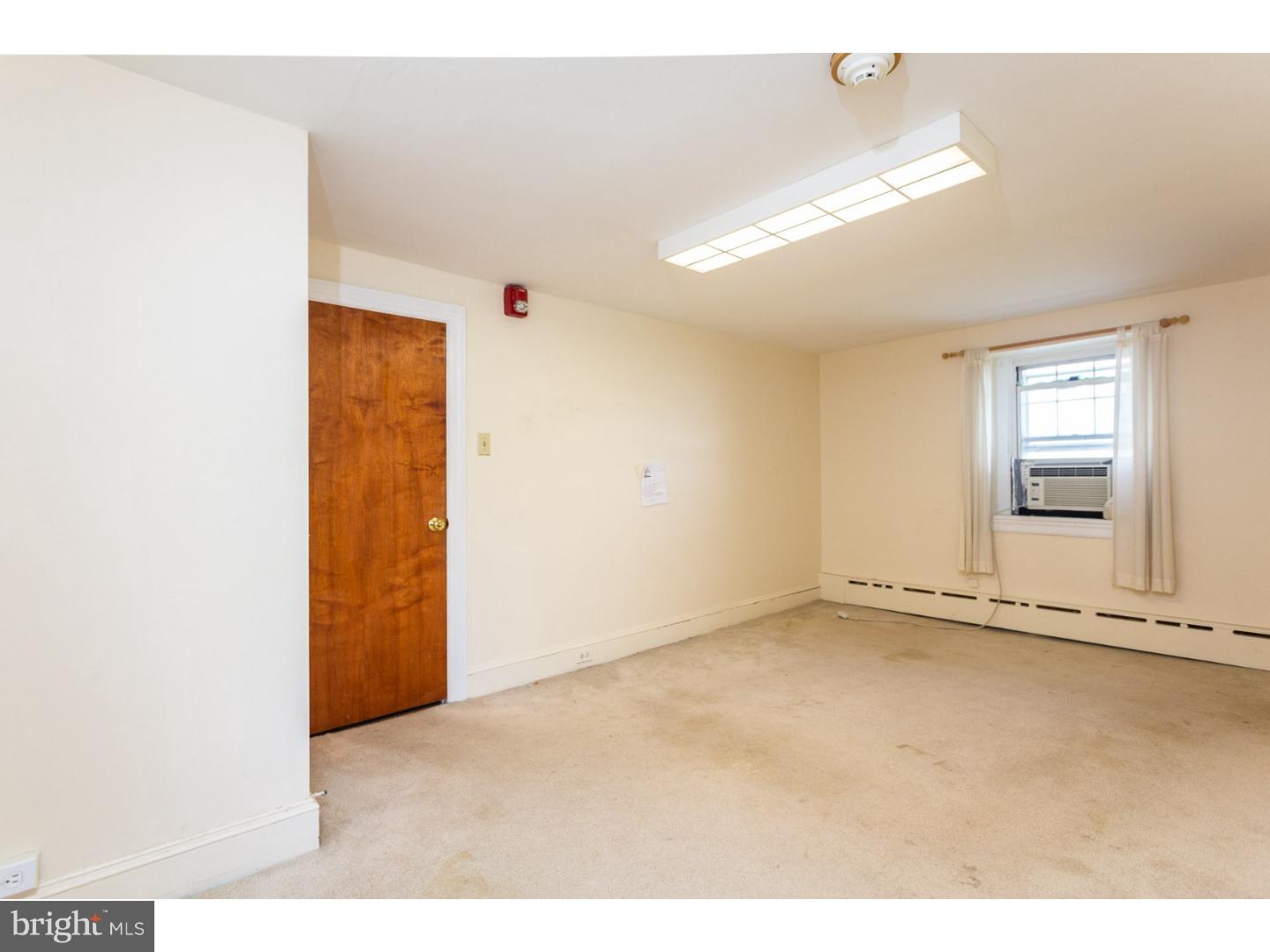 291 New Garden Road Avondale, PA 19311 - Photo 25 of 25 an empty room with a empty space and windows