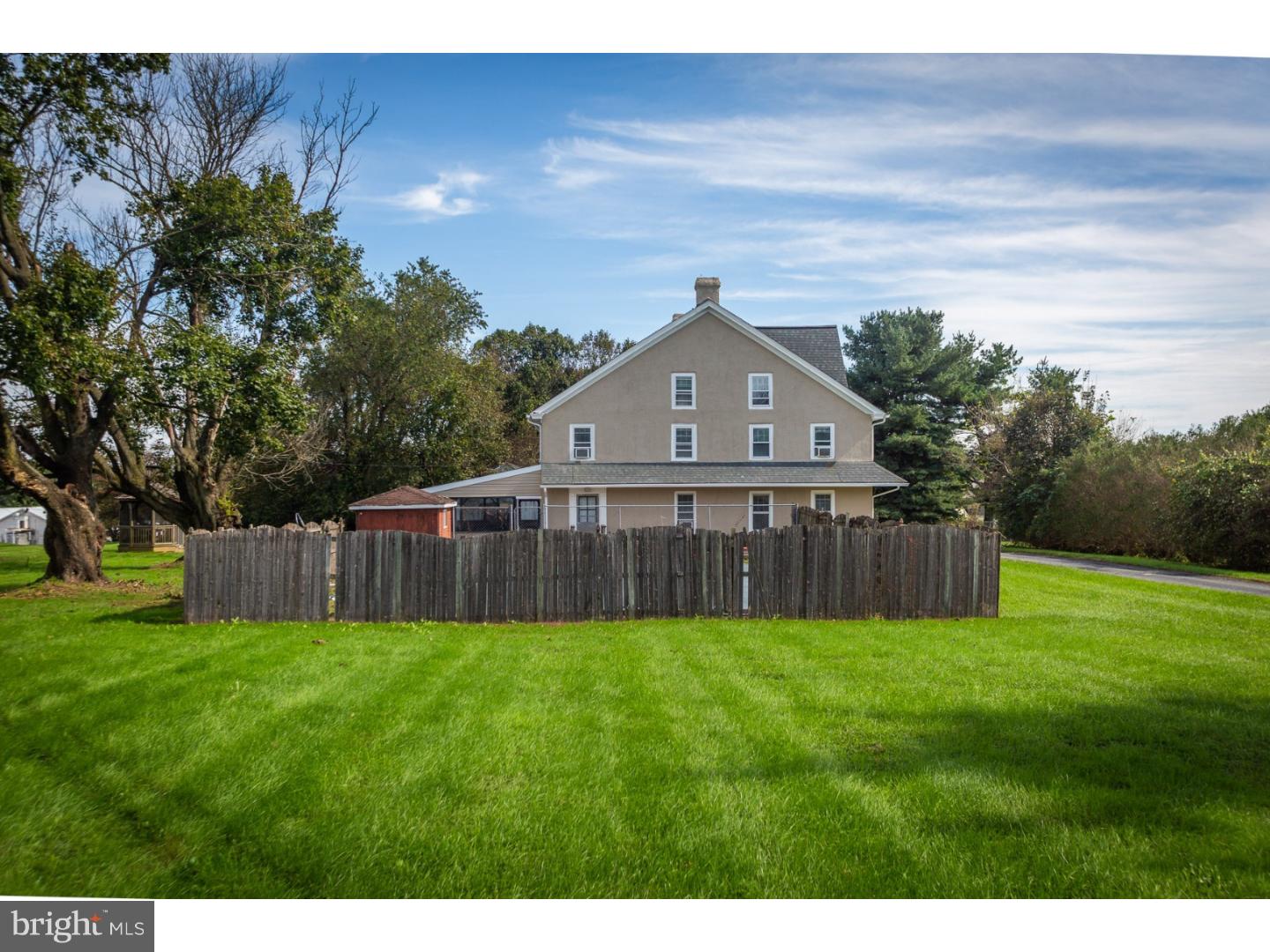 291 New Garden Road Avondale, PA 19311 - Photo 4 of 25 a view of a house with a yard and fence