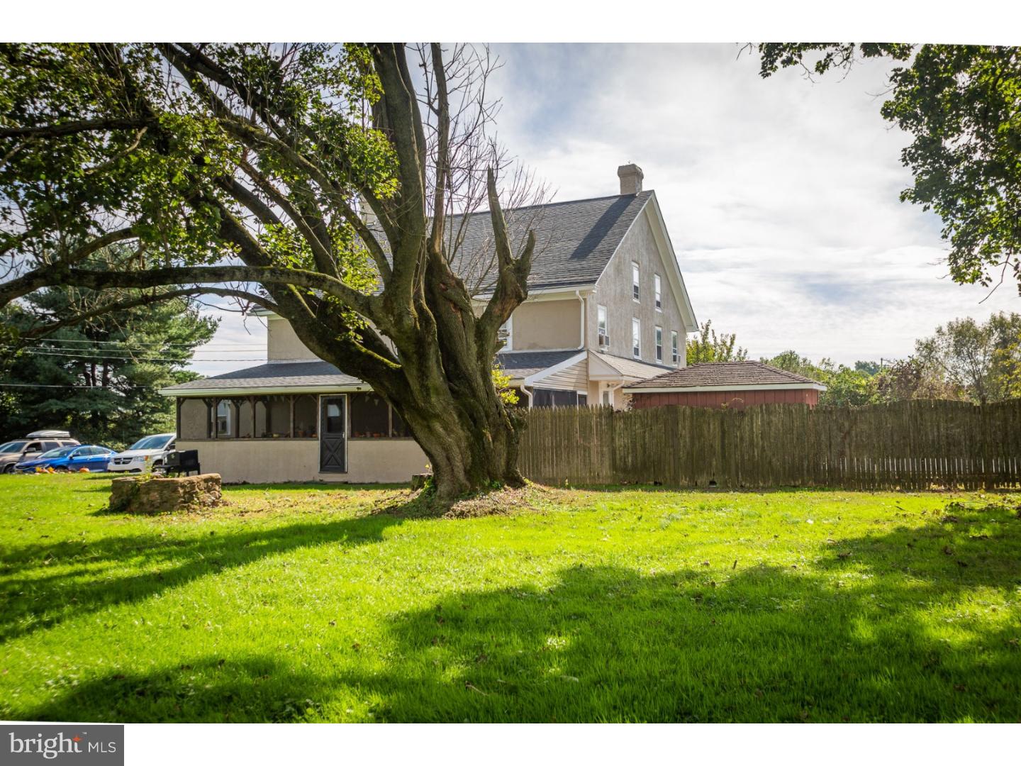 291 New Garden Road Avondale, PA 19311 - Photo 7 of 25 a view of a house with a yard and a large tree