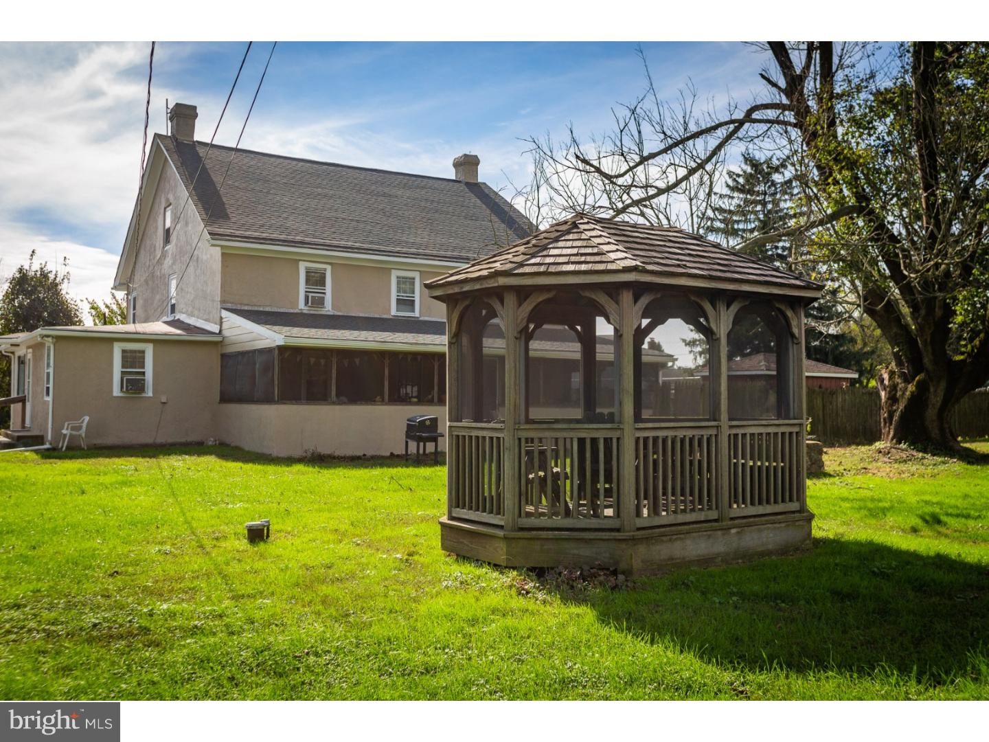 291 New Garden Road Avondale, PA 19311 - Photo 8 of 25 a view of a house with a yard
