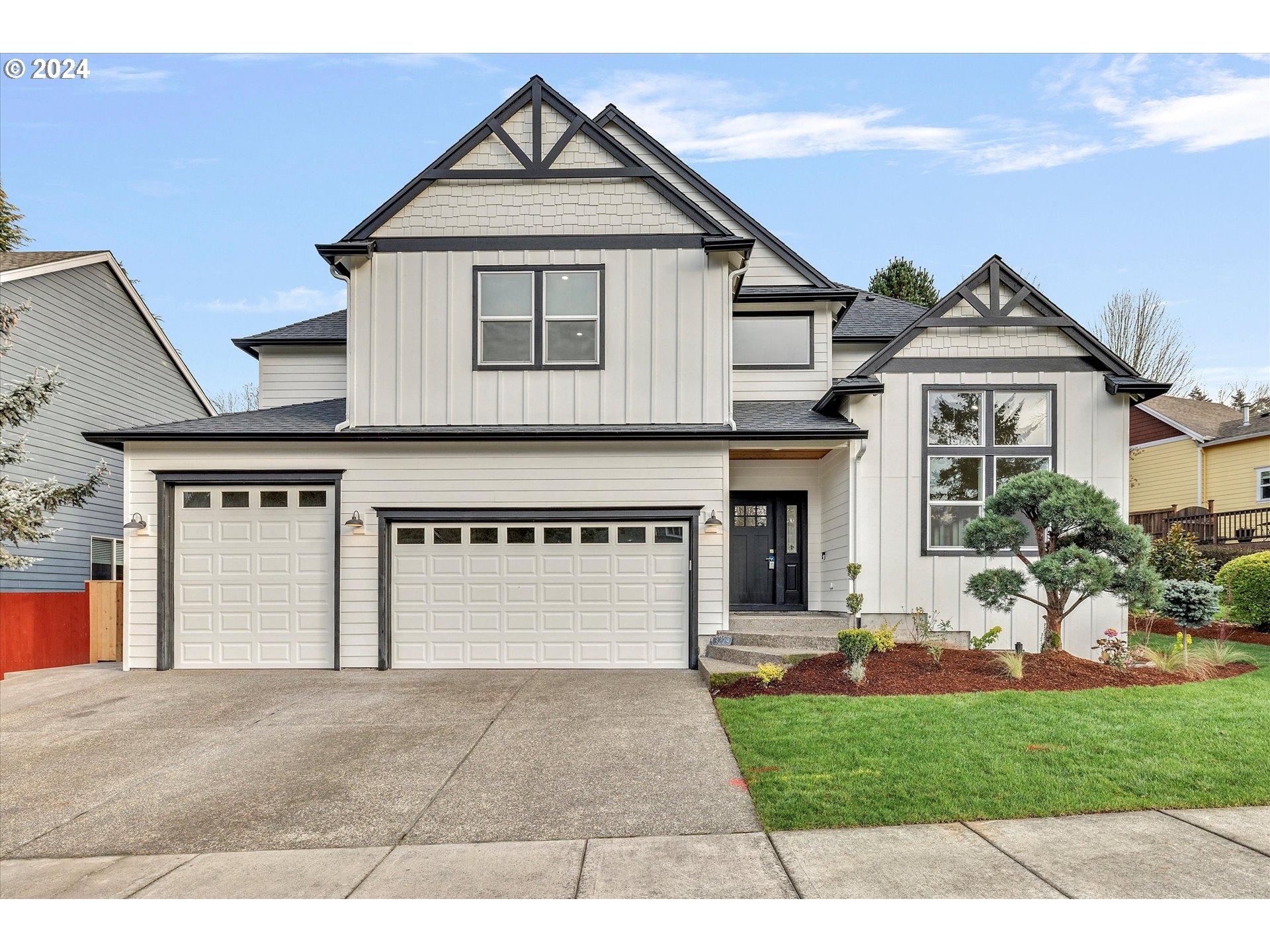 3279 Ridge Pointe Drive Forest Grove, OR 97116 - Photo 1 of 44 a front view of a house with a yard and garage