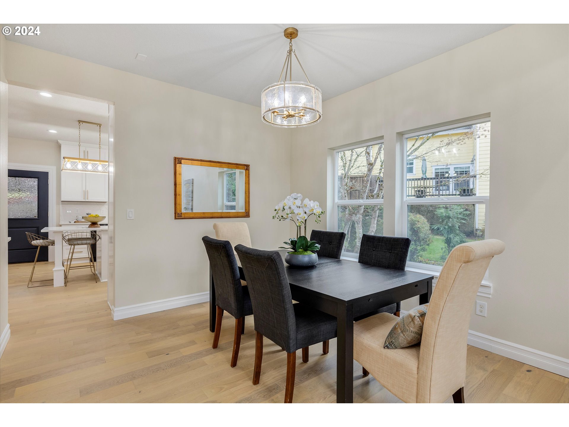 3279 Ridge Pointe Drive Forest Grove, OR 97116 - Photo 6 of 44 a view of a dining room with furniture window and wooden floor